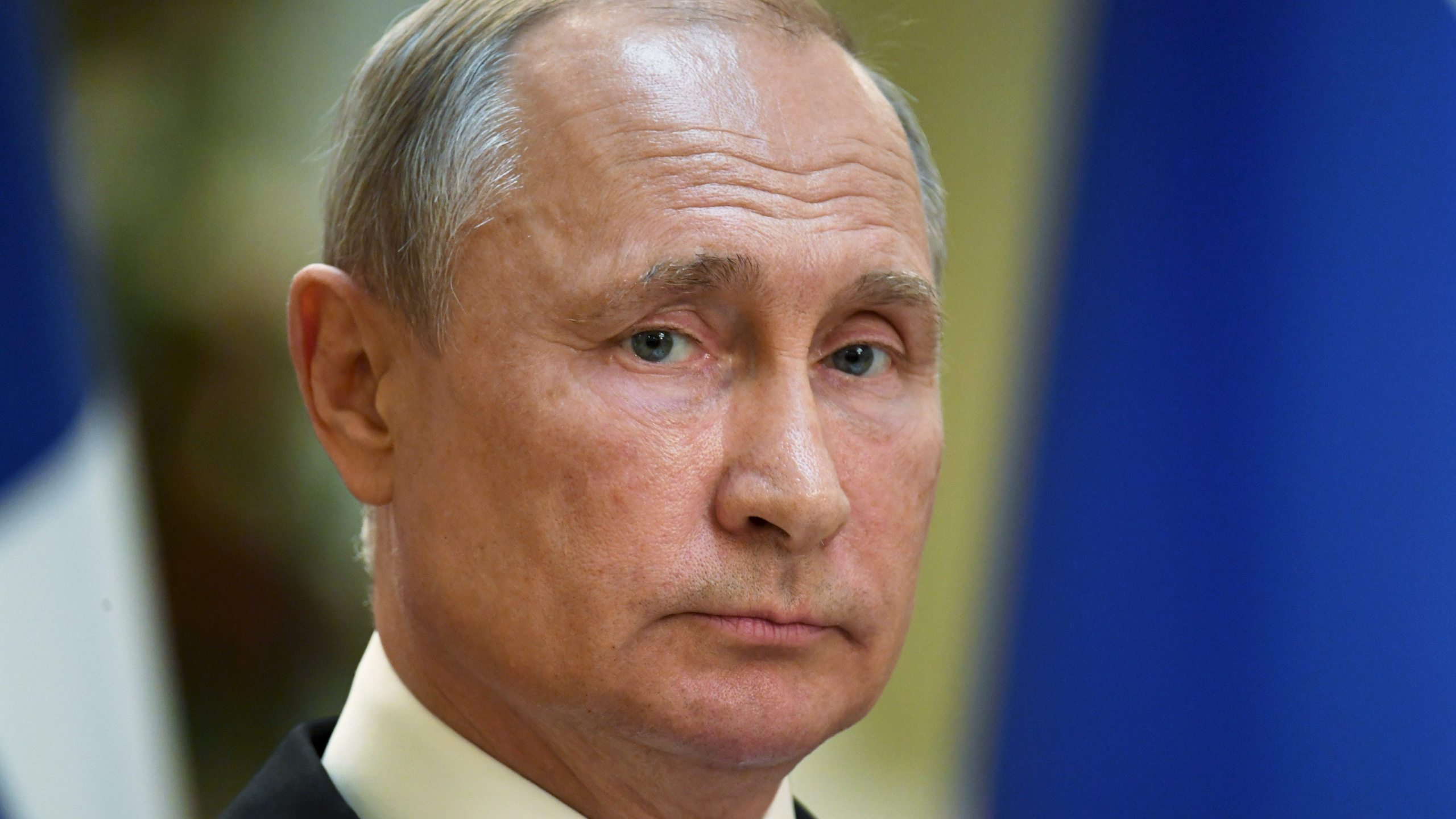 Russian President Vladimir Putin looks on during a press conference after a meeting with his Finnish counterpart at the Presidental Palace in Helsinki, Finland on Aug. 21, 2019. (Credit: ANTTI AIMO KOIVISTO/AFP/Getty Images)