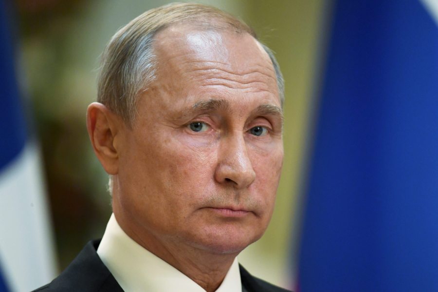 Russian President Vladimir Putin looks on during a press conference after a meeting with his Finnish counterpart at the Presidental Palace in Helsinki, Finland on Aug. 21, 2019. (Credit: ANTTI AIMO KOIVISTO/AFP/Getty Images)