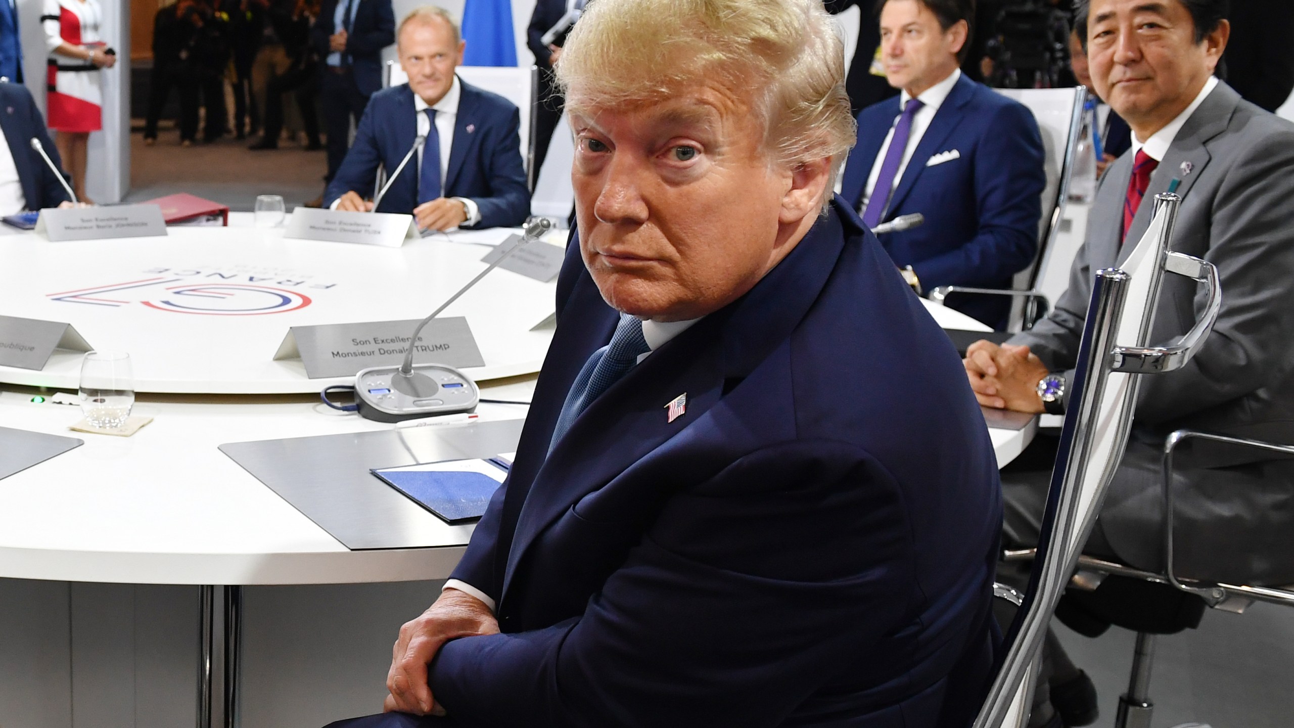 Donald Trump attends the first working session of the G-7 Summit on Aug. 25, 2019, in Biarritz, France. (Jeff J Mitchell - Pool /Getty Images)