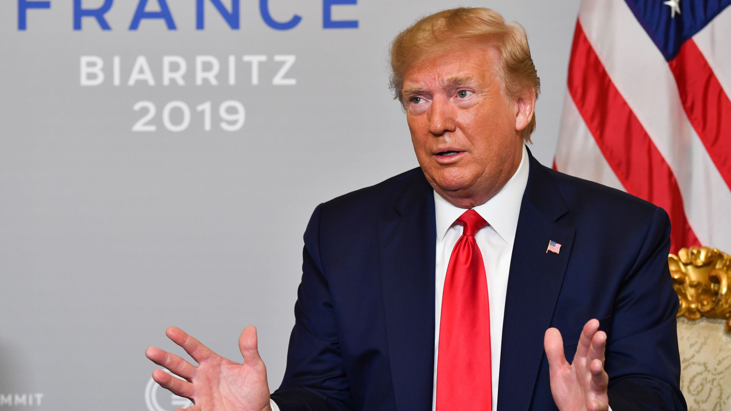 US President Donald Trump reacts during his a bilateral meeting with Egyptian President and Chairman of the African Union Abdel Fattah al-Sissi in Biarritz, south-west France on August 26, 2019, on the third day of the annual G7 Summit. (Credit: NICHOLAS KAMM/AFP/Getty Images)