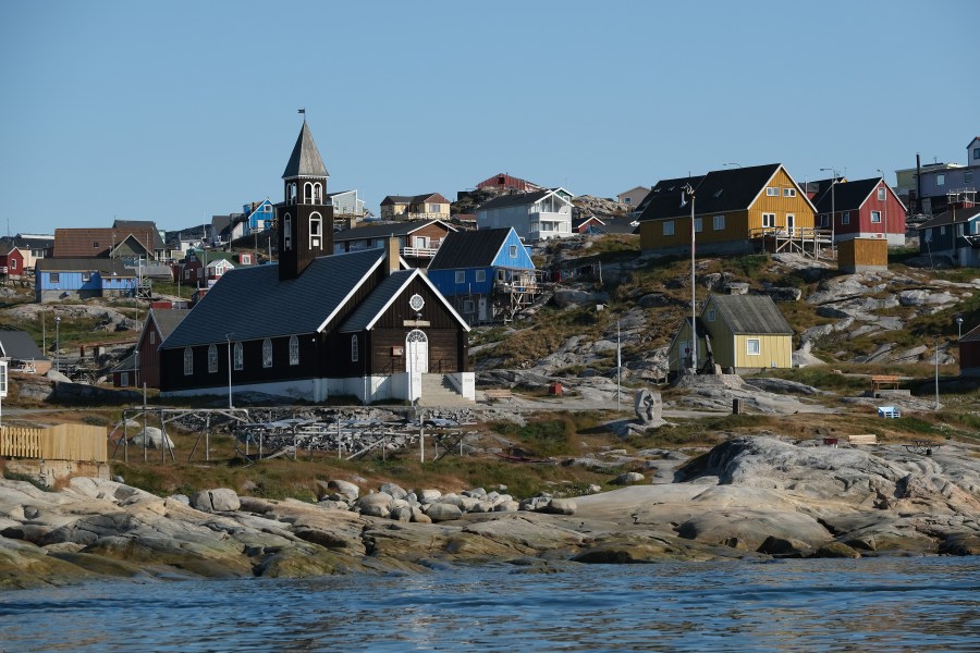 Zion Lutheran Church, built in 1779, stands on Disko Bay on August 04, 2019 in Ilulissat, Greenland. (Credit: Sean Gallup/Getty Images)