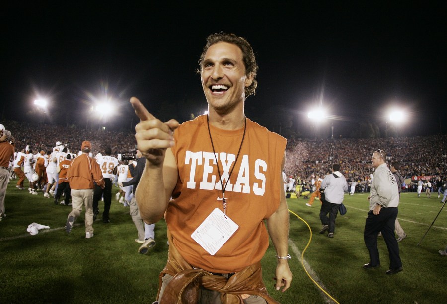 Actor Matthew McConaughey celebrates on the field after the Texas Longhorns defeated the Michigan Wolverines in the 91st Rose Bowl Game at the Rose Bowl on January 1, 2005 in Pasadena, California. (Credit: Donald Miralle/Getty Images)