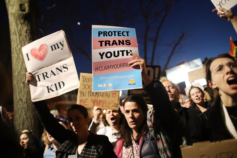 On Feb. 23, 2017, hundreds protest a recent Trump administration announcement to rescind an Obama-era order allowing transgender students to use school bathrooms matching their gender identities. Demonstrators were rally at the Stonewall Inn in New York City, widely known as the birthplace of the LGBTQ revolution. (Credit: Spencer Platt/Getty Images)