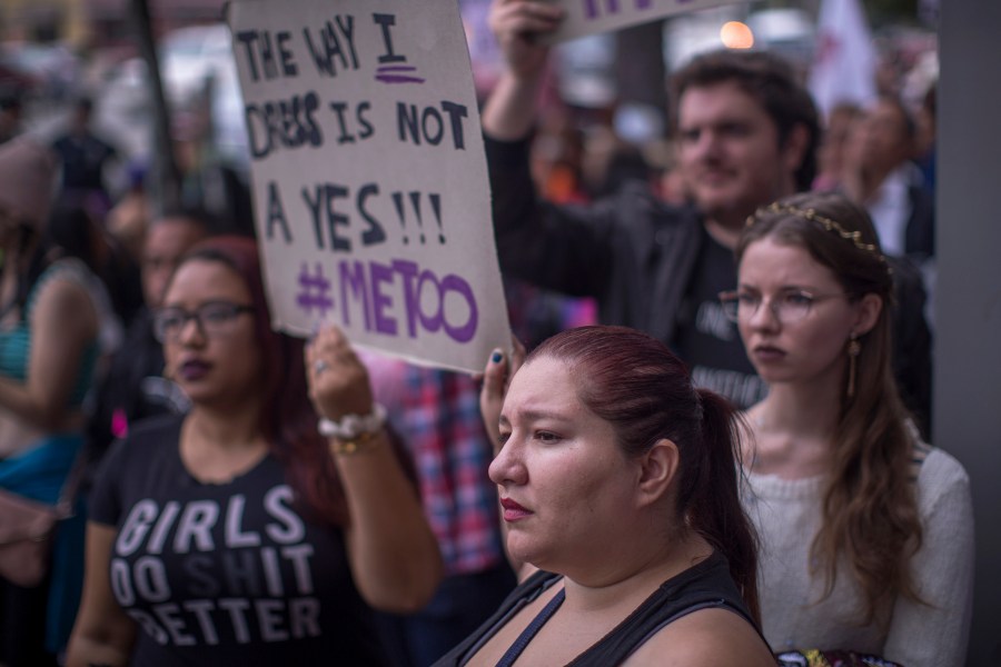 Demonstrators participate in the #MeToo Survivors' March outside the CNN building in response to several high-profile sexual harassment scandals on Nov. 12, 2017, in Los Angeles. (Credit: David McNew/Getty Images)