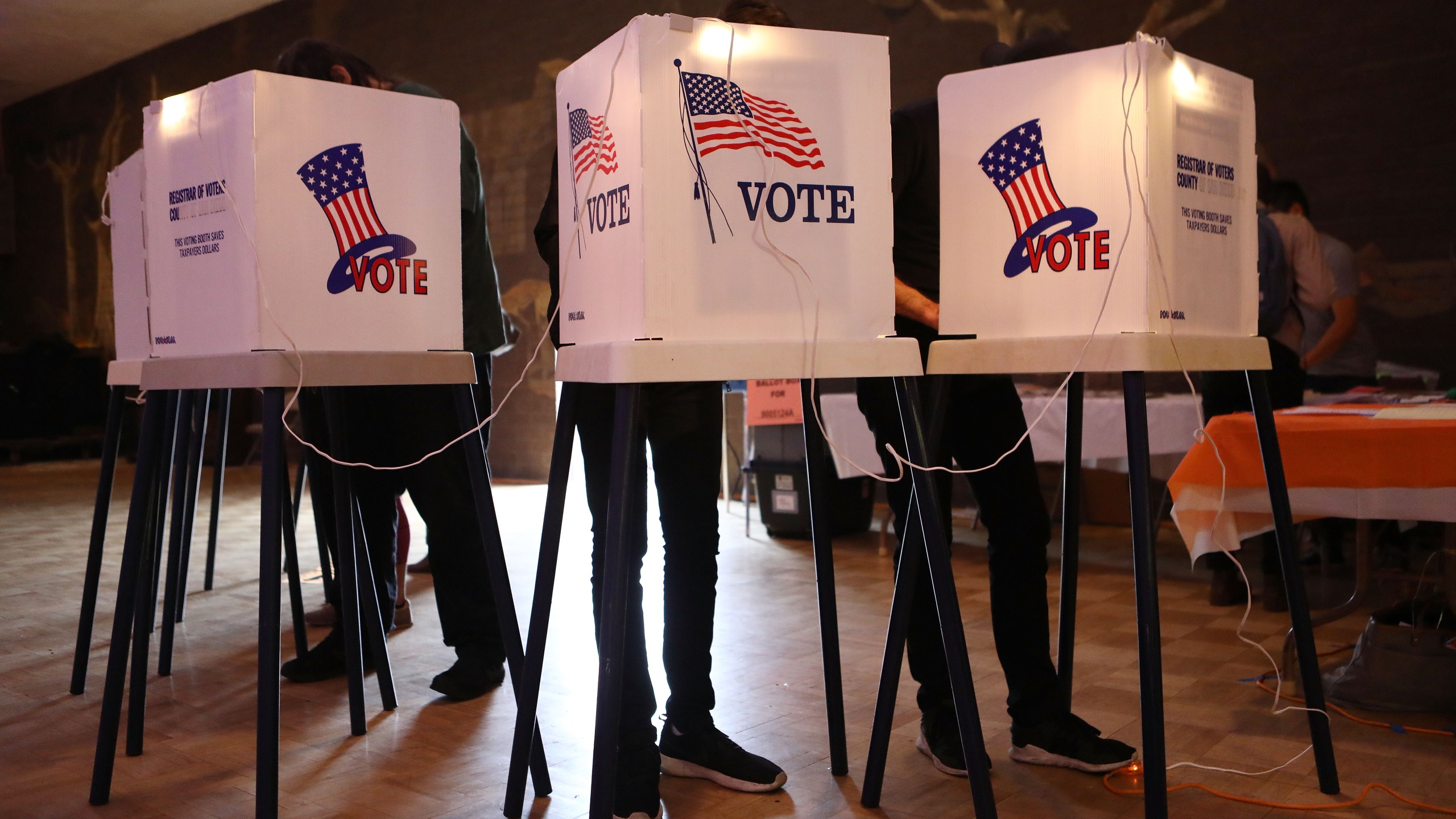 Voters cast their ballots at a Masonic Lodge in Los Angeles on June 5, 2018. (Credit: Mario Tama / Getty Images)