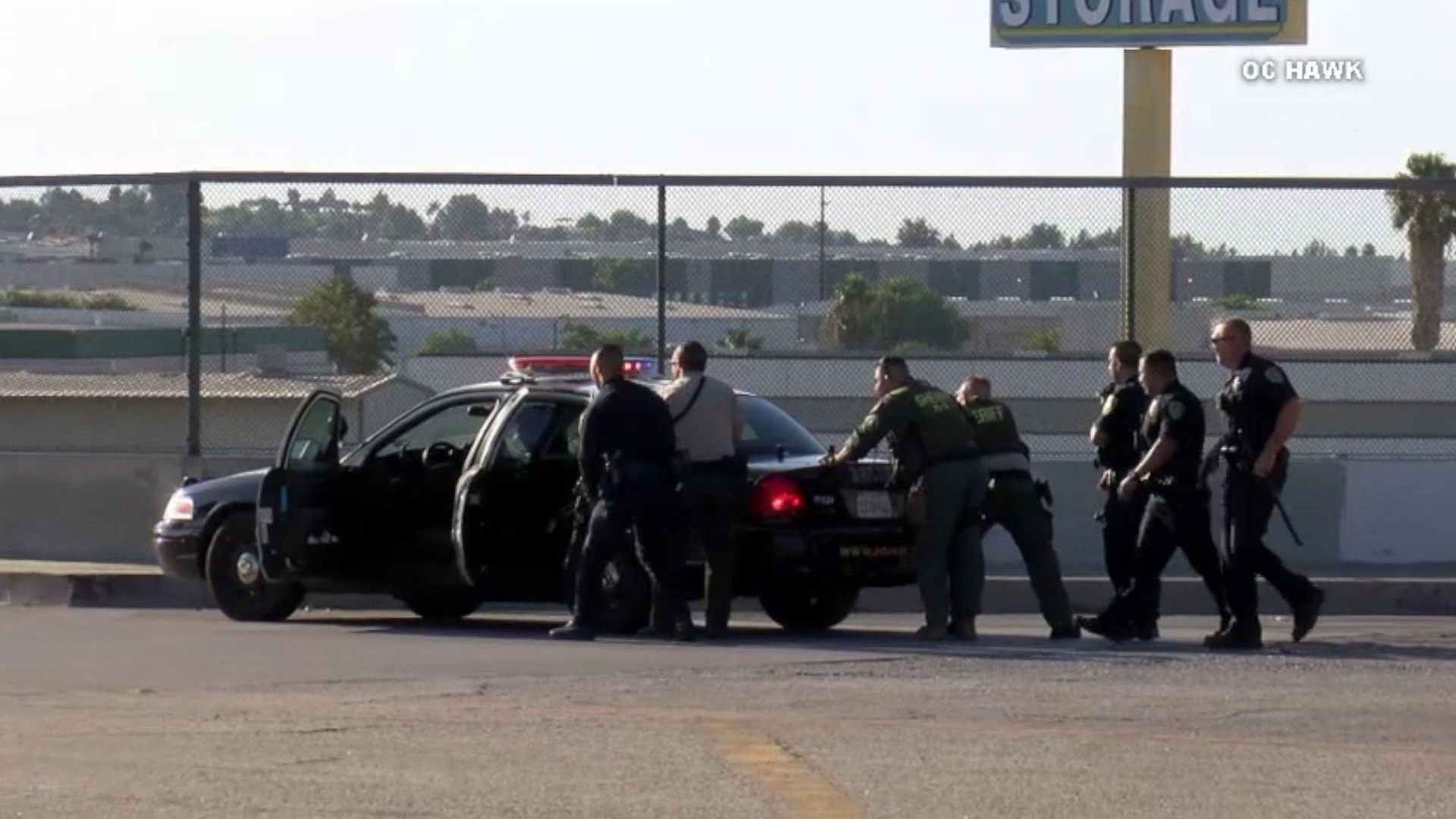 Authorities respond Aug. 12, 2019, to a Riverside gun battle that left one CHP officer dead and two others wounded; the gunman was also killed. (Credit: OC Hawk)