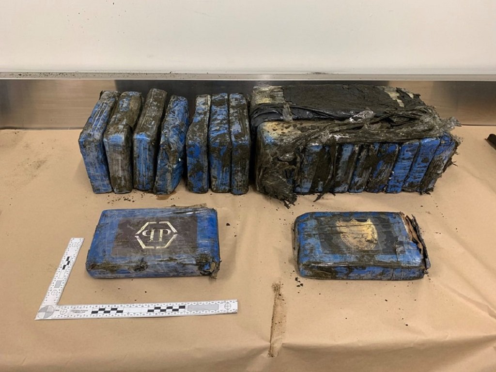 Packages containing millions of dollars worth of cocaine have washed up on a New Zealand beach. (Credit: New Zealand Police via CNN Wire)