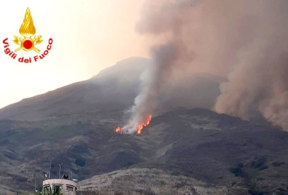 A spectacular explosion from an Italian volcano Wednesday sent locals and tourists running for cover to avoid a shower of rocks and ash. (Credit: AP)