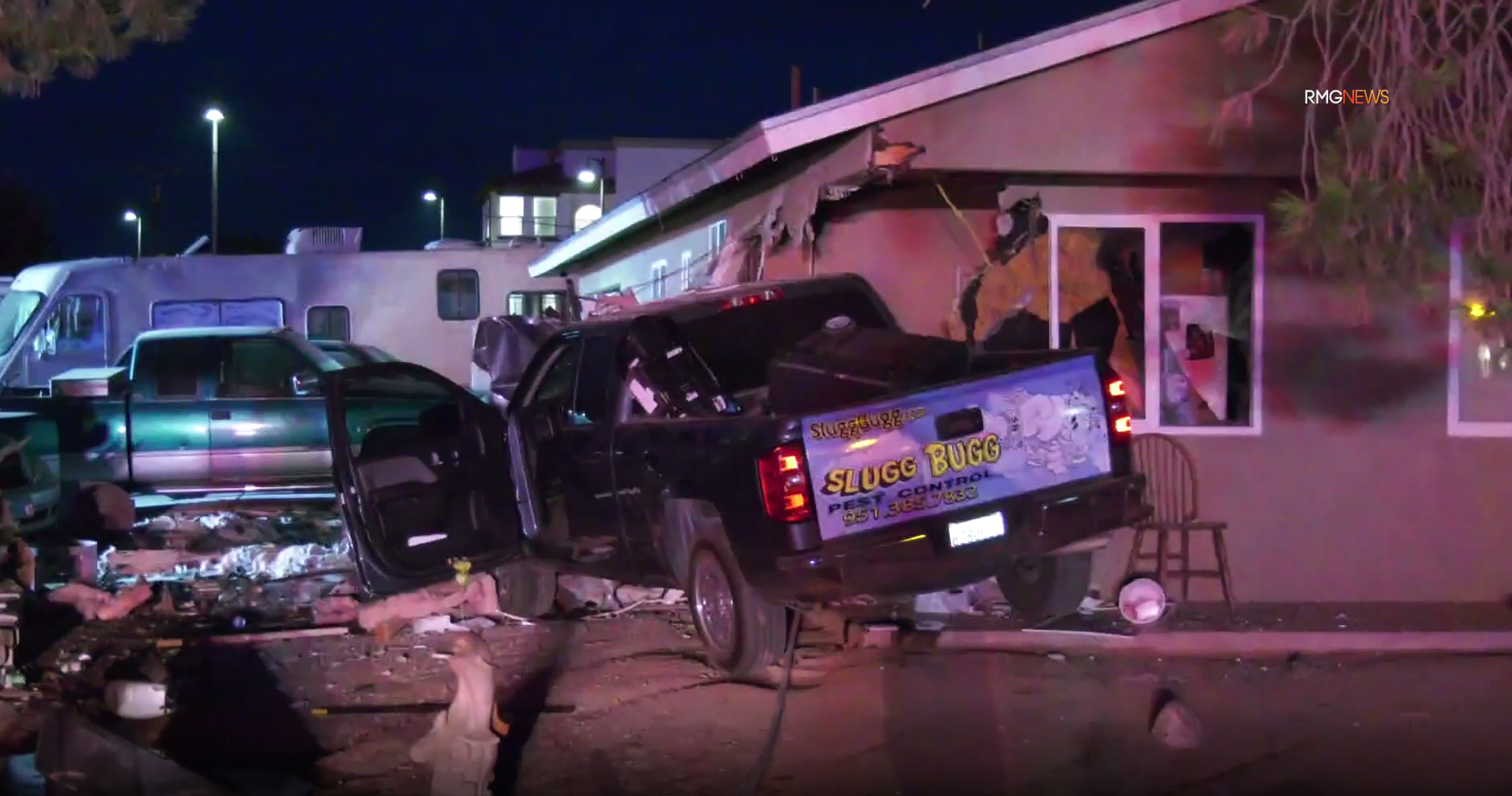 A pickup truck can be seen lodged into a home in Beaumont after crashing on August 3, 2019. (Credit: RMG News)