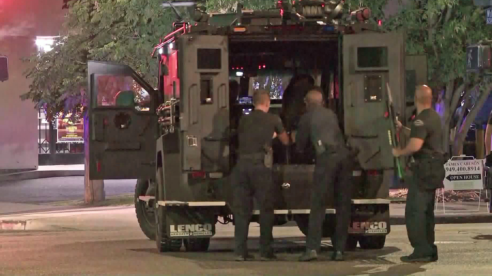 SWAT officers arrived to a barricade situation in Reseda on Aug. 28, 2019. (Credit: KTLA)