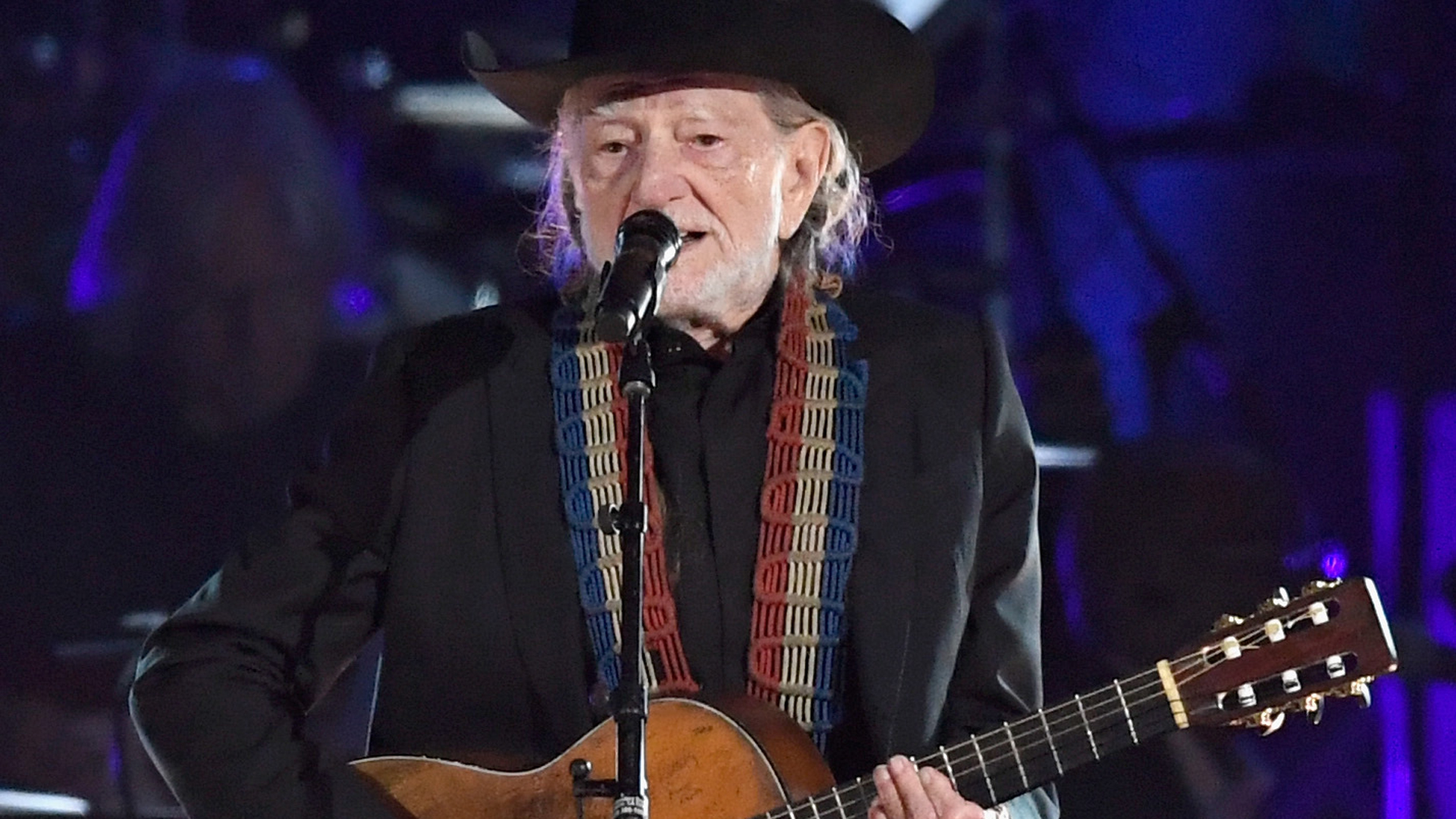 Willie Nelson performs onstage during MusiCares Person of the Year honoring Dolly Parton at Los Angeles Convention Center on February 8, 2019 in Los Angeles. (Credit: Frazer Harrison/Getty Images)