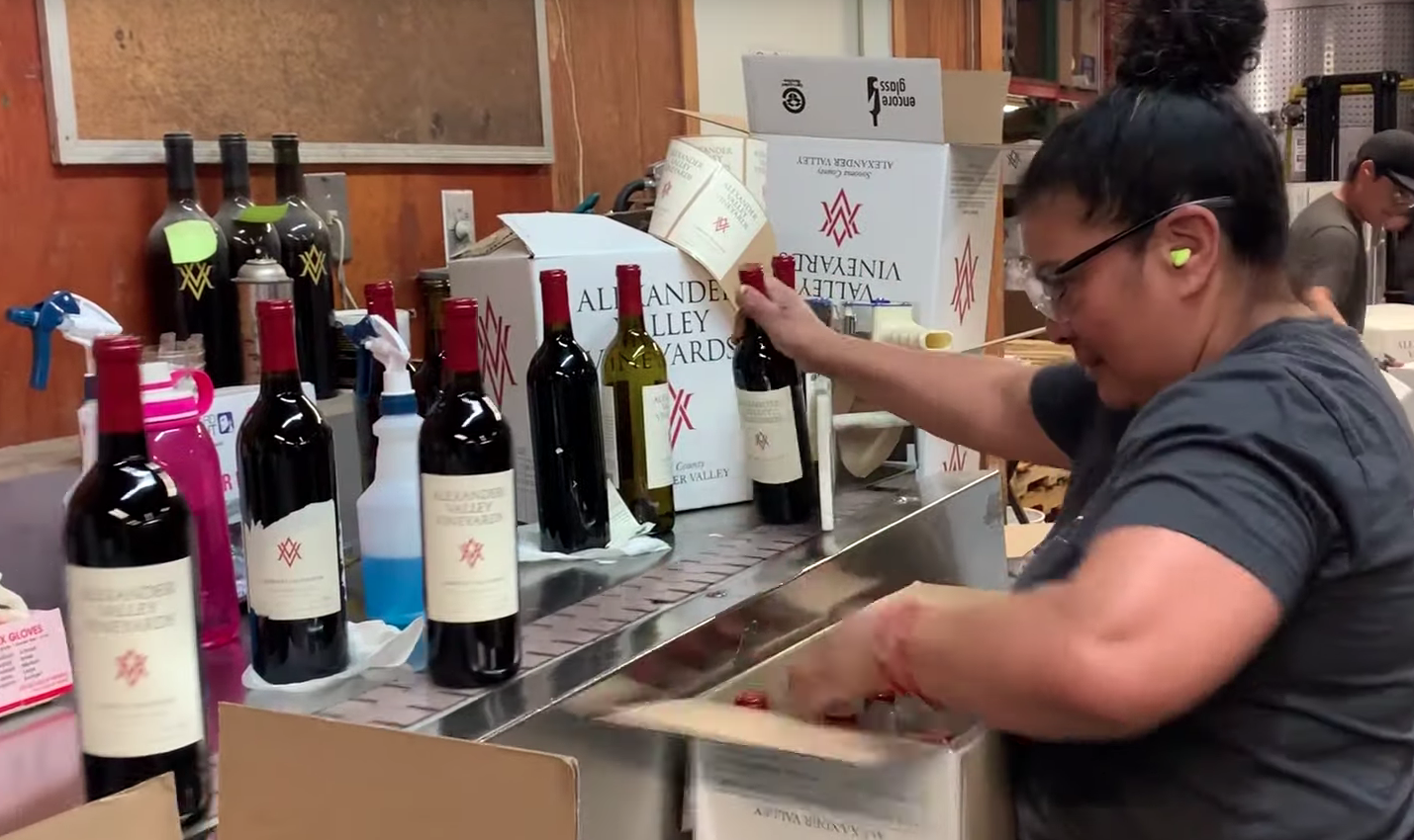 An employee packs wine at the Alexander Valley Vineyards in Sonoma County in a video by the Los Angeles Times published on Aug. 18, 2019. (Credit: Los Angeles Times)