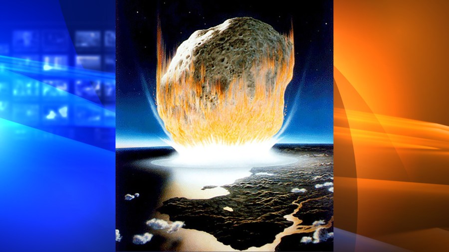 An artist's interpretation of the asteroid impact that caused the extinction of the dinosaurs. (Credit: NASA/Don Davis)