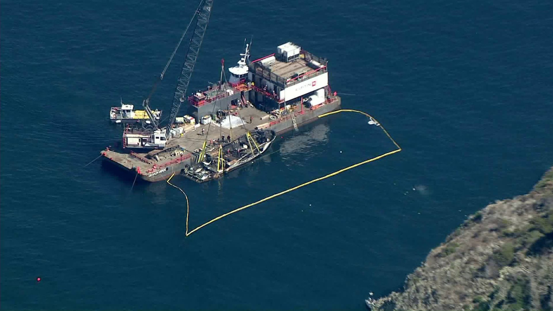 The Conception dive boat is raised more than a week after the fatal fire on Sept. 12, 2019. (Credit: KTLA)