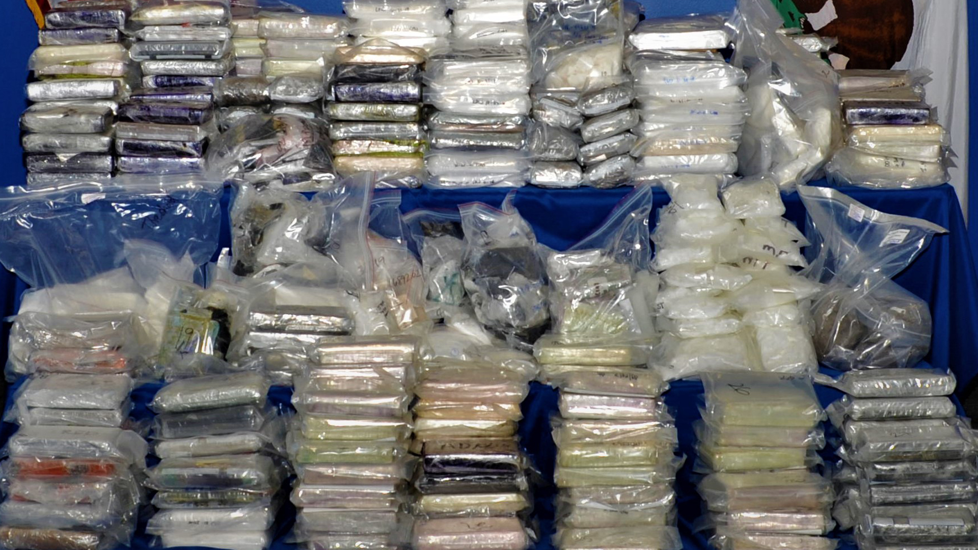 Hundreds of pounds of narcotics seized as part of a federal investigation into drug trafficking are seen in this photo released by the U.S. Department of Justice on Sept. 5, 2019.