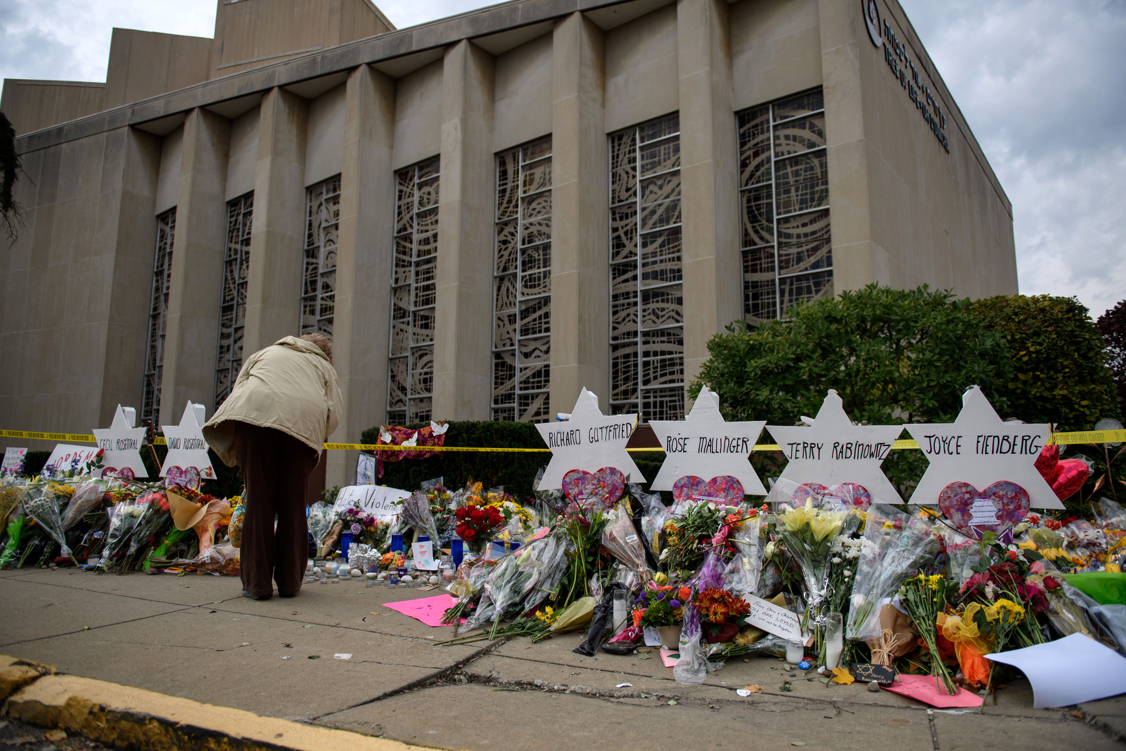 Mourners visit the memorial outside the Tree of Life Synagogue in Pittsburgh on Oct. 31, 2018. (Credit: Jeff Swensen/Getty Images)