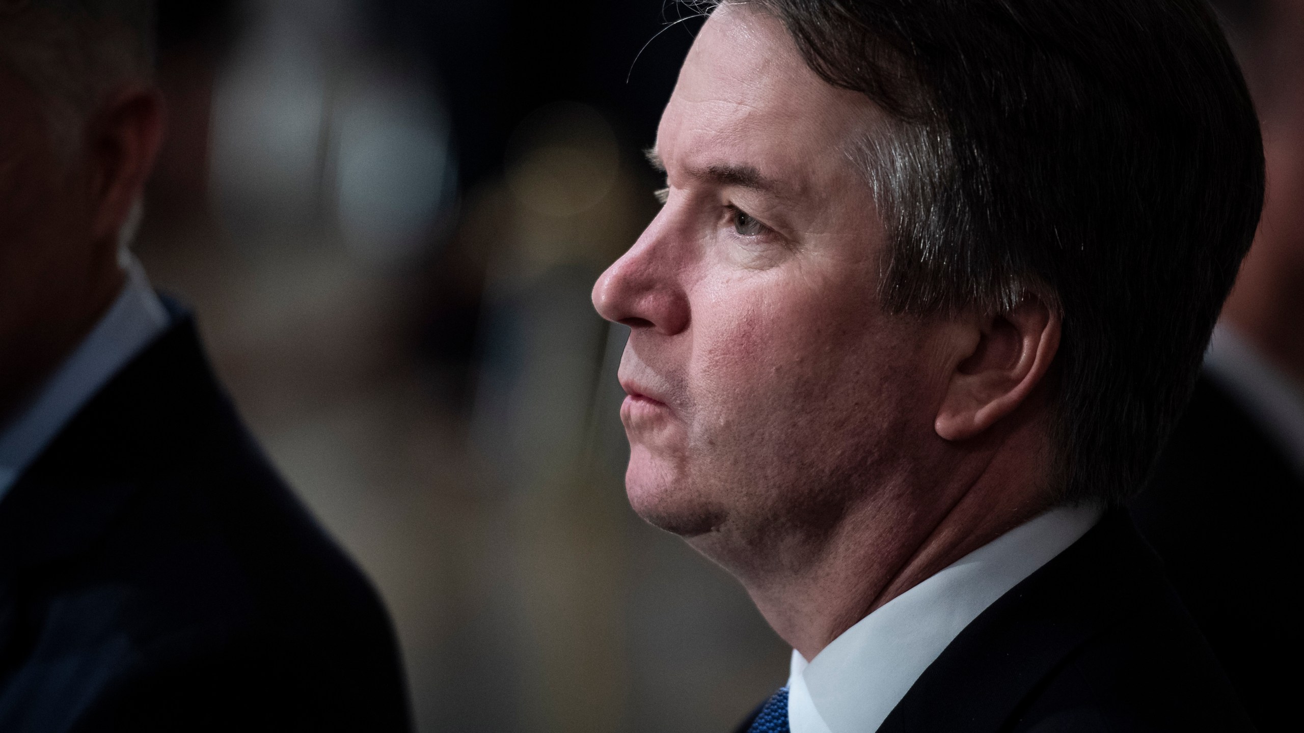 Supreme Court Associate Justice Brett Kavanaugh stands at the U.S Capitol Rotunda as former President George H.W. Bush lies in state on Dec. 3, 2018. (Credit: Jabin Botsford / Getty Images)