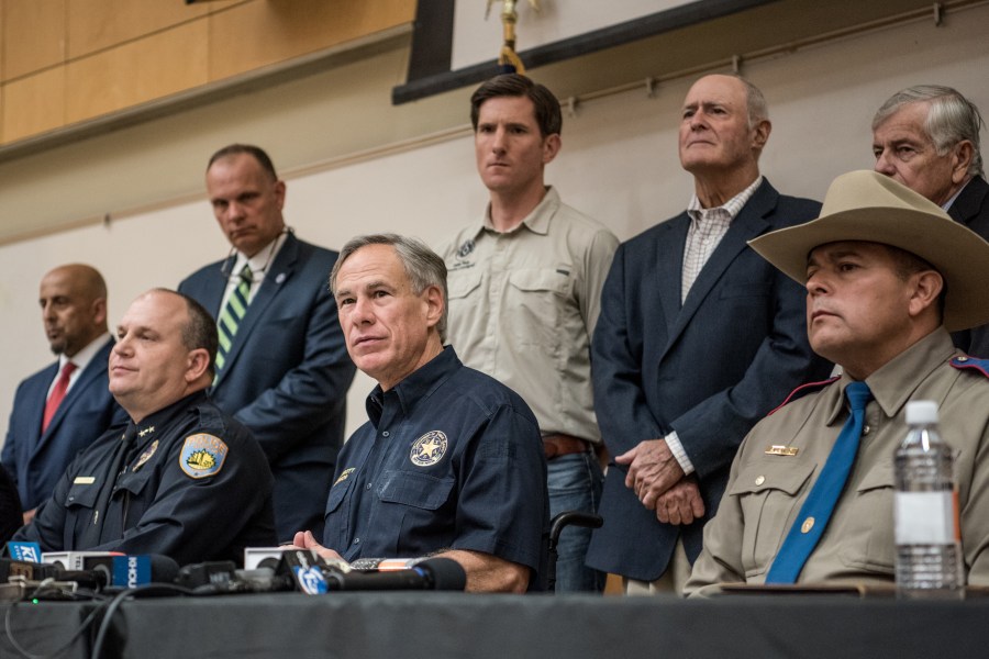 Texas Gov. Greg Abbott (center) holds a press conference with local and federal law enforcement at the University of Texas of the Permian Basin (UTPB) following a deadly shooting on Sept. 1, 2019, in Odessa, Texas.. On the left is Odessa Police Chief Michael Gerke. (Credit: Cengiz Yar/Getty Images)