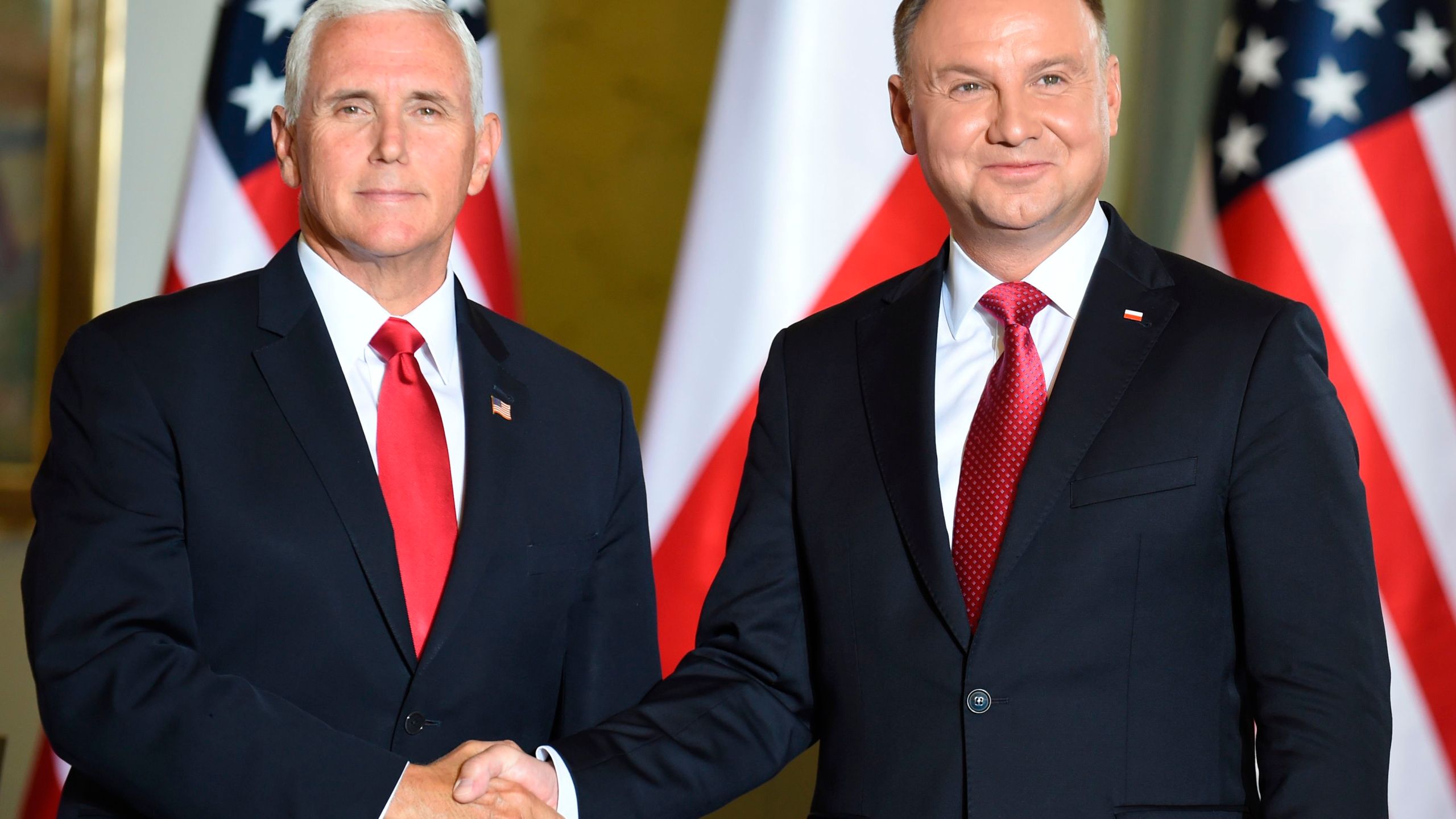 Polish President Andrzej Duda (right) shakes hand with U.S. Vice President Mike Pence during a meeting in Warsaw on Sept. 2, 2019. (Credit: JANEK SKARZYNSKI/AFP/Getty Images)