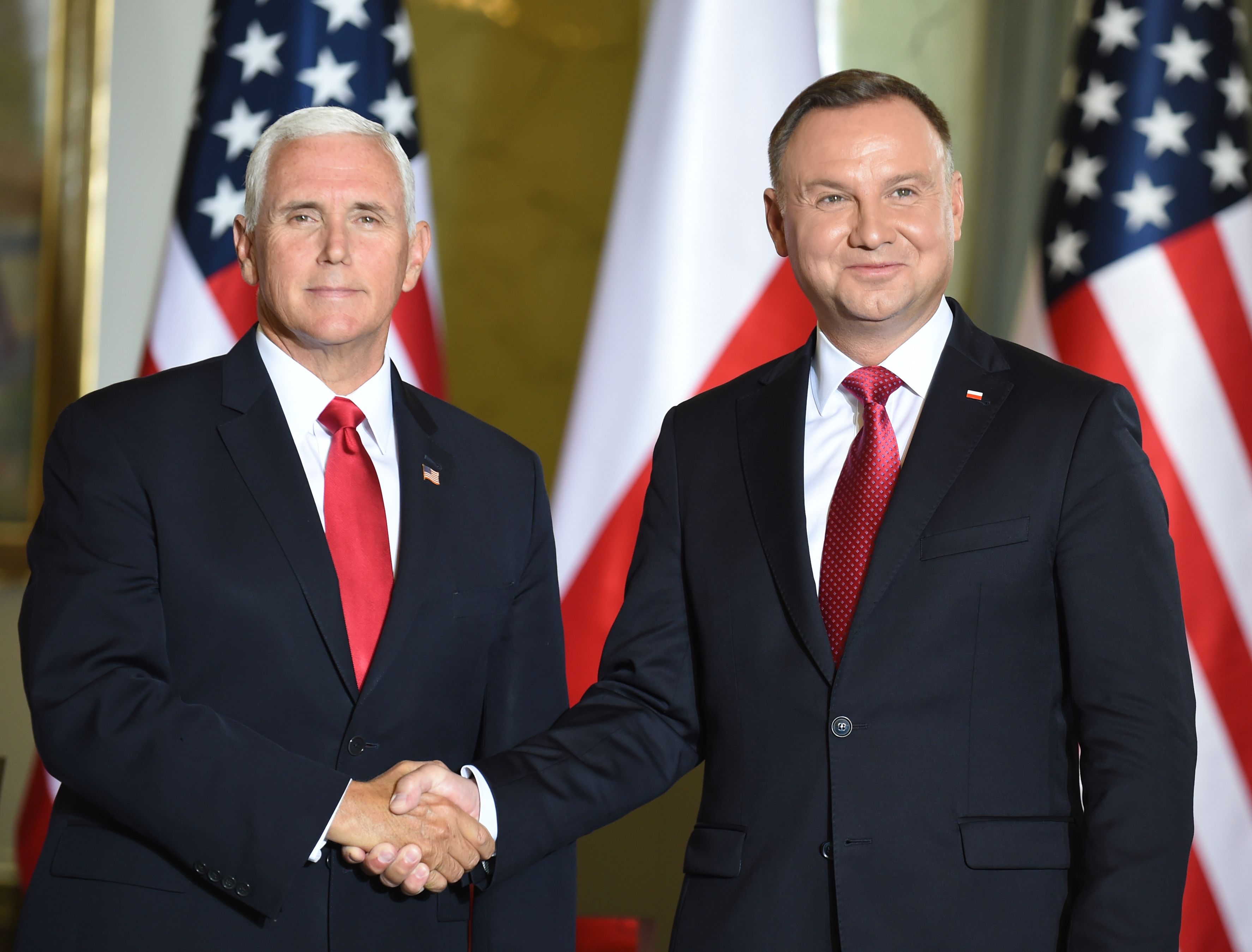 Polish President Andrzej Duda (right) shakes hand with U.S. Vice President Mike Pence during a meeting in Warsaw on Sept. 2, 2019. (Credit: JANEK SKARZYNSKI/AFP/Getty Images)