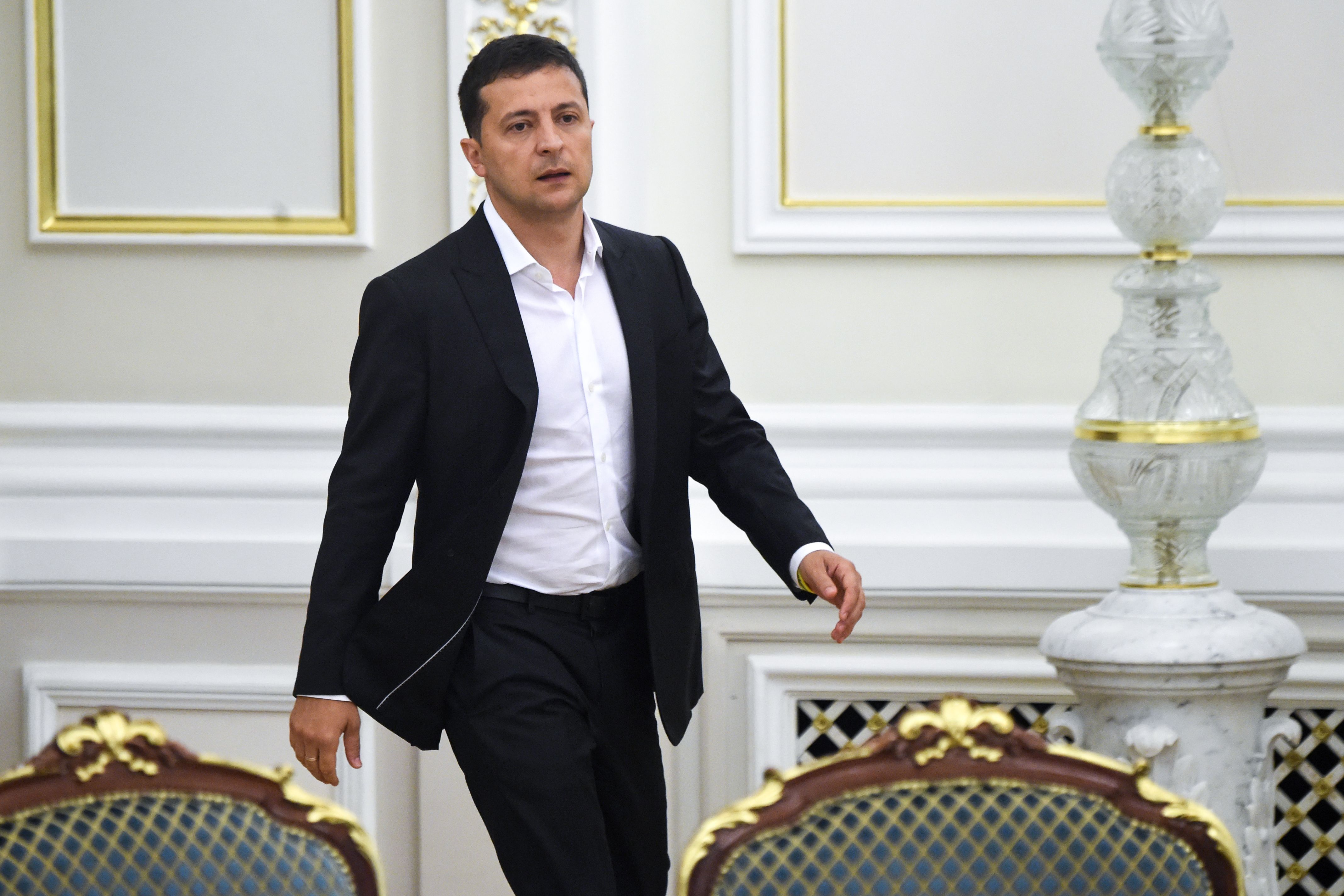 Ukrainian President Volodymyr Zelensky arrives for a meeting with the new members of the government and new president of Parliament, in Kiev on Sept. 2, 2019. (Credit: SERGEI SUPINSKY/AFP/Getty Images)