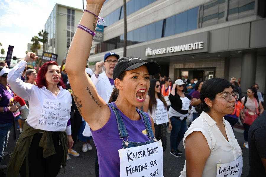 Kaiser Permanente health care workers, patients and their supporters march in a Labor Day protest in Los Angeles on Sept. 2, 2019. (Credit: Robyn Beck / AFP / Getty Images)