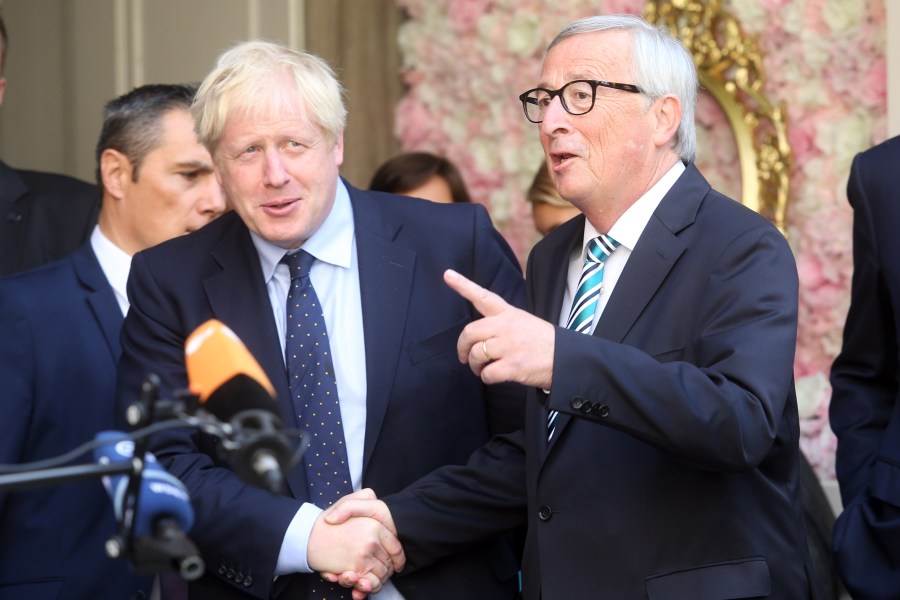 European Union Commission president Jean-Claude Juncker (R) welcomes British Prime Minister Boris Johnson (L) prior to their meeting, on Sept. 16, 2019, in Luxembourg. (Credit: FRANCOIS WALSCHAERTS/AFP/Getty Images)