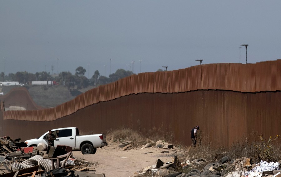 Mexican security forces patrol the U.S.-Mexico border fence in Tijuana Baja California state, Mexico, on Sept. 18, 2019, in preparation for U.S. President Donald Trump's visit to the border wall in Otay Mesa following a rally in San Diego. (Credit: GUILLERMO ARIAS/AFP/Getty Images)