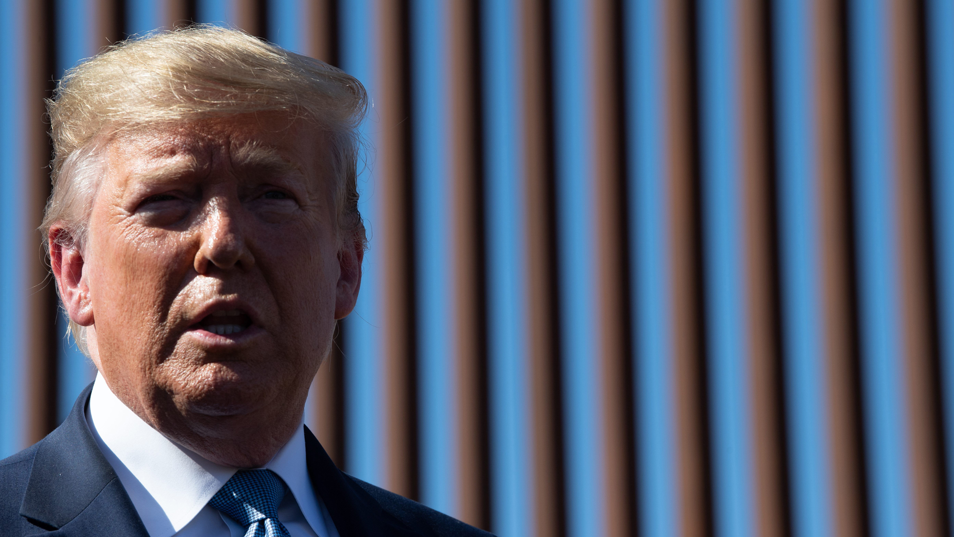 Donald Trump visits the US-Mexico border fence in Otay Mesa, California on Sept. 18, 2019. (Nicholas Kamm/AFP/Getty Images)