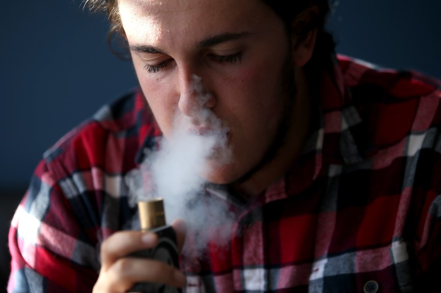 A man smokes an E-Cigarette on Jan. 28, 2015, in San Rafael, California. (Credit: Justin Sullivan/Getty Images)