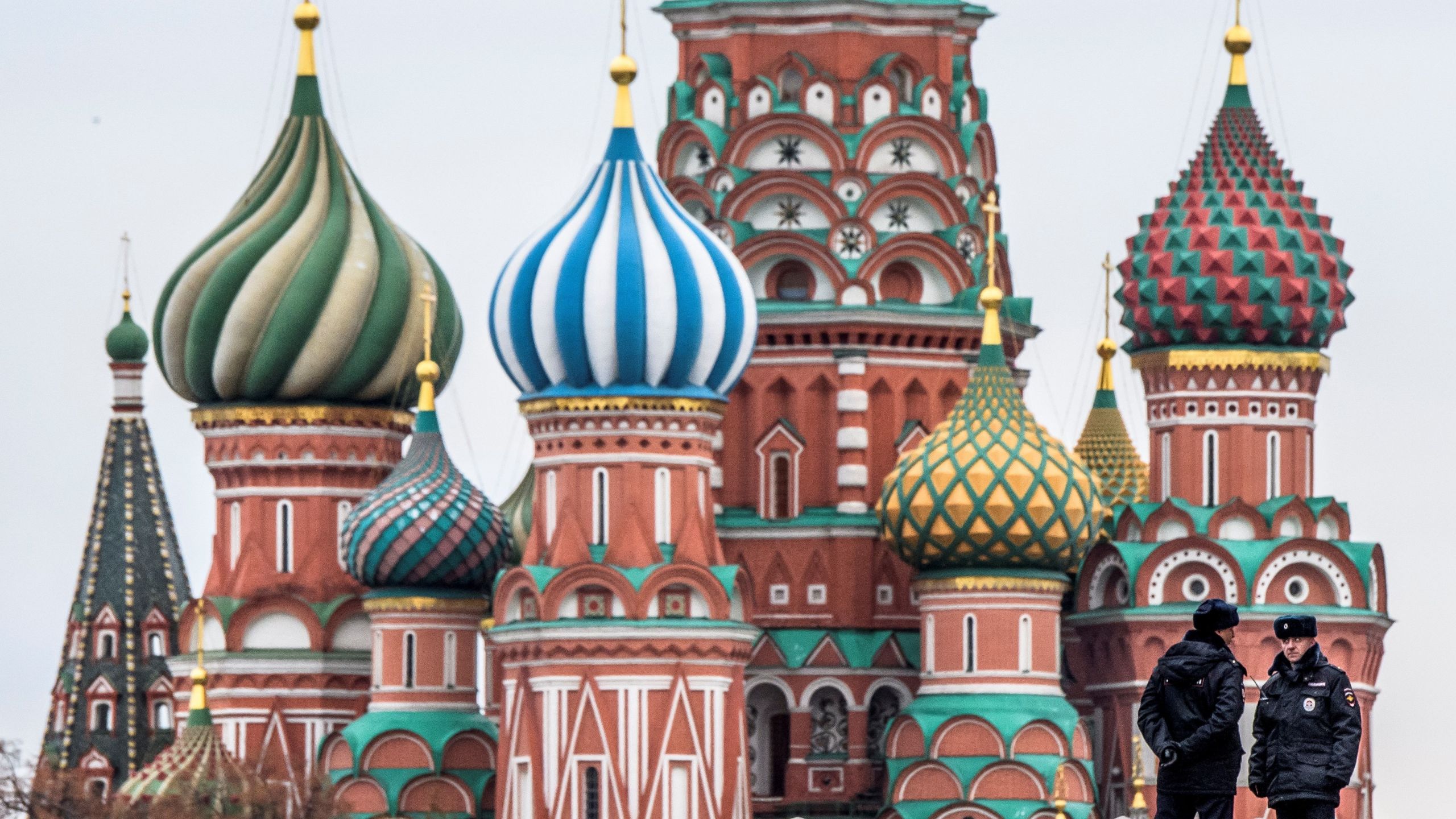 Two policemen stand guard on the Red Square in front of St. Basil Cathedral on National Unity Day in Moscow on November 4, 2017. (Credit: MLADEN ANTONOV/AFP/Getty Images)