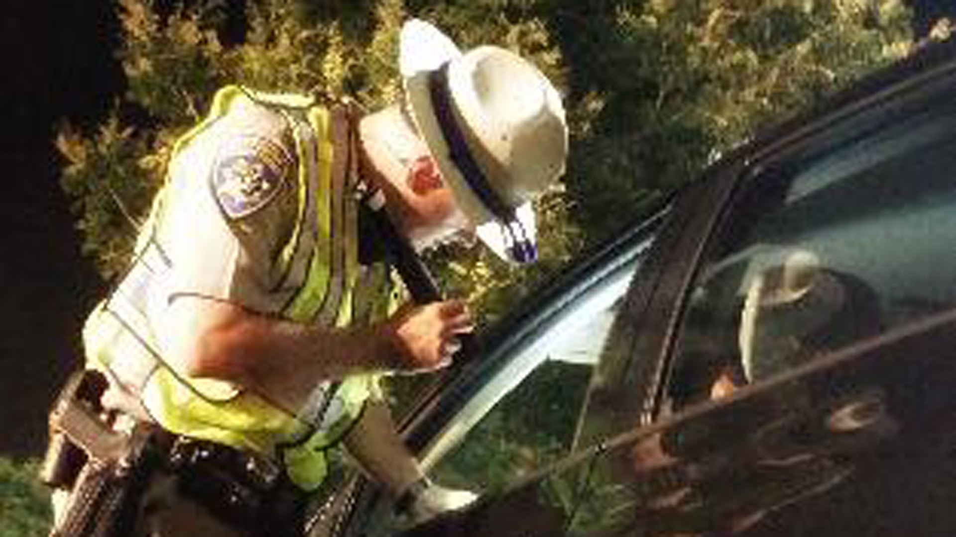 In this CHP photo, an officer is seen at a checking a motorist at a DUI checkpoint over Labor Day weekend.