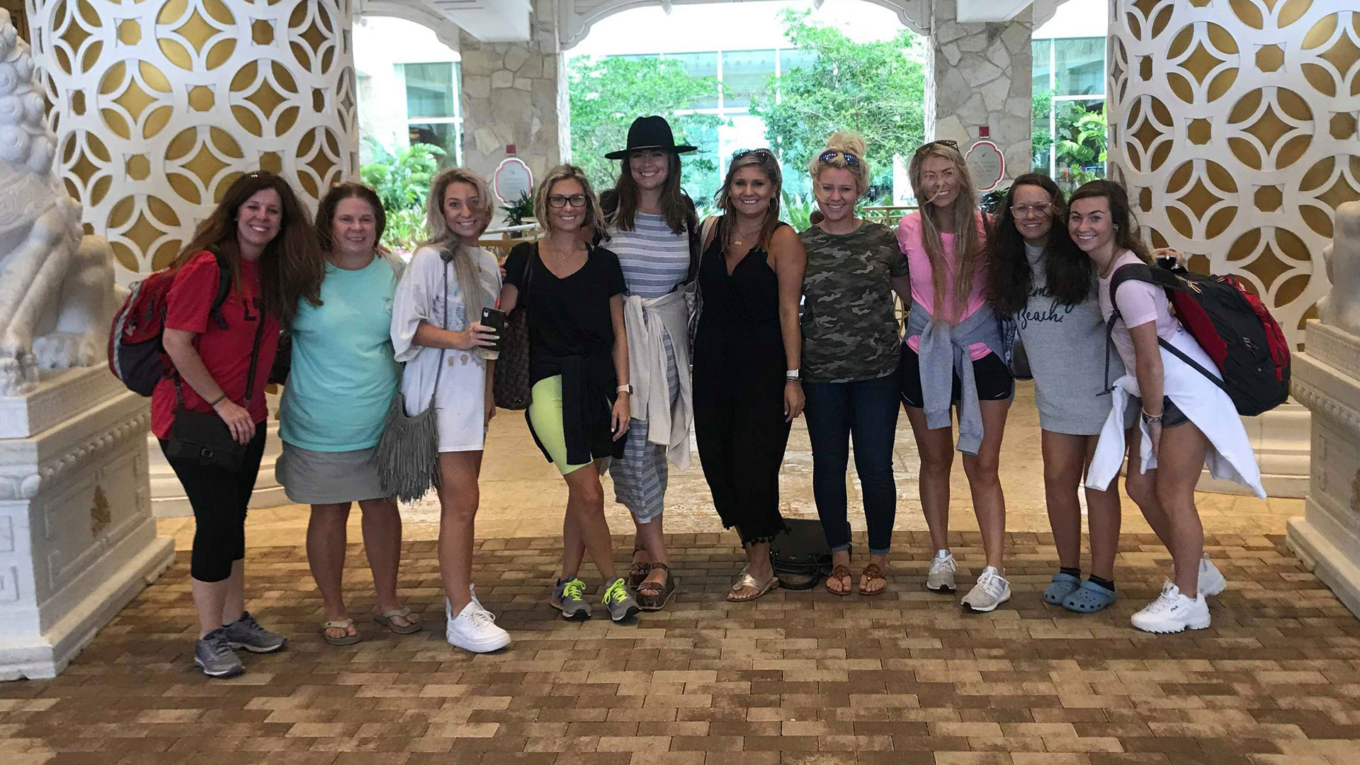 The bride to be, Rikki Kahley, fourth from left, poses with her bachelorette party, including her mother, Sandy Gibbs Kahley, second from left, and sister Chloe, third from left. (Credit: Rikki Kahley)