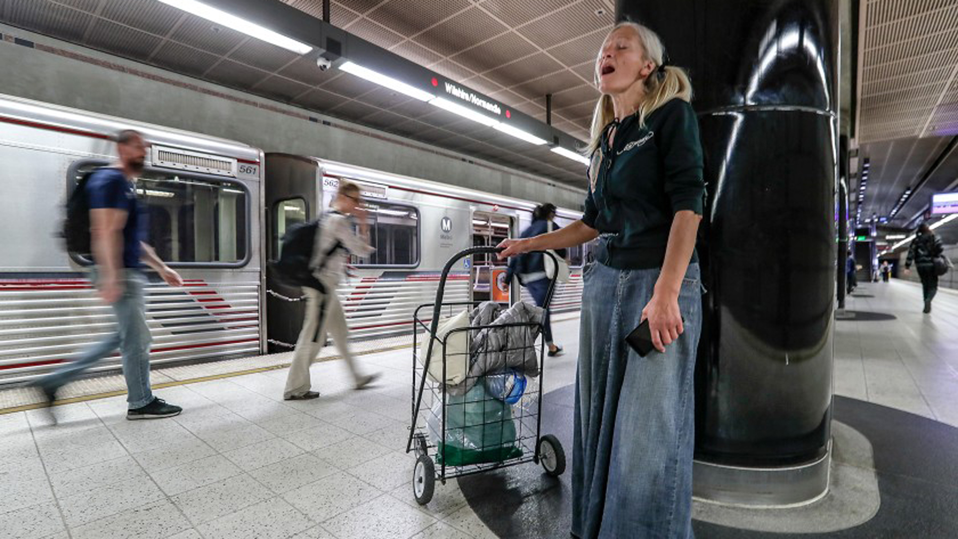 Emily Zamourka sings in a subway station in Koreatown.(Credit: Robert Gauthier / Los Angeles Times)