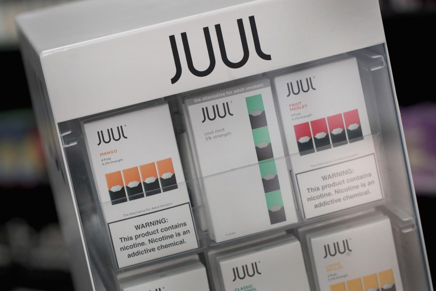 Electronic cigarettes and pods by Juul, the nation's largest maker of vaping products, are displayed for sale at the Smoke Depot in Chicago on Sept. 13, 2018. (Credit: Scott Olson / Getty Images)