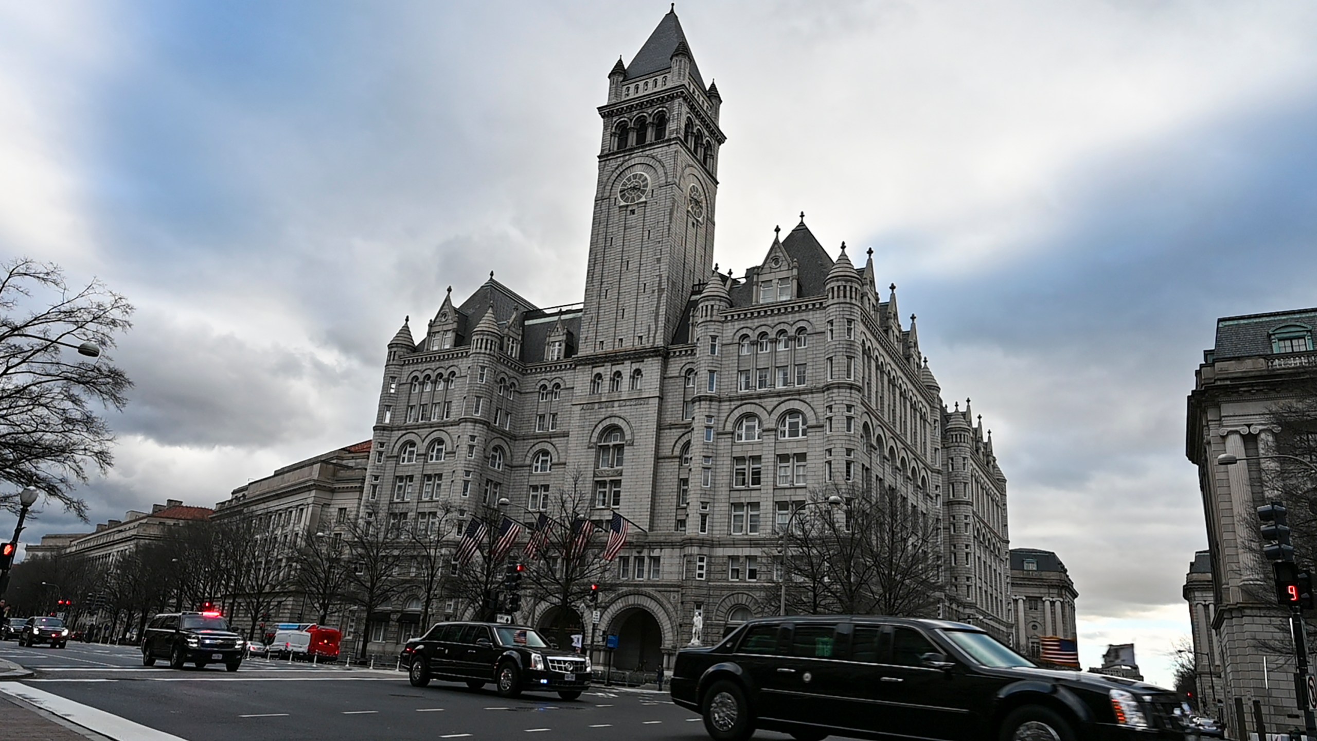 An official motorcade speeds down Pennsylvania Avenue past the International Trump Hotel in Washington, D.C., on Jan. 24, 2019. (Credit: Eva Hambach/AFP/Getty Images)