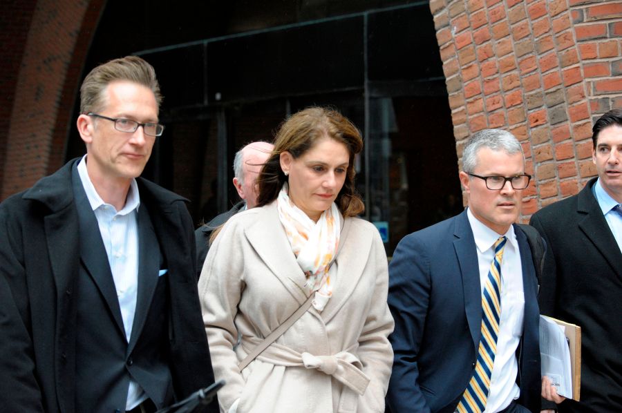 Michelle Janavs makes her way out of the courthouse after giving her plea in front of a judge for charges in the college admissions scandal at the John Joseph Moakley U.S. Courthouse on March 29, 2019. (Credit: JOSEPH PREZIOSO/AFP/Getty Images)