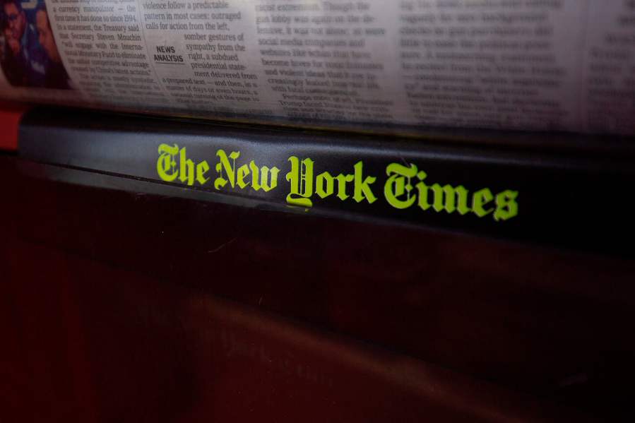 The New York Times logo is seen on a newspaper rack at a convenience store in Washington, D.C., on Aug. 6, 2019. (Credit: ALASTAIR PIKE/AFP/Getty Images)