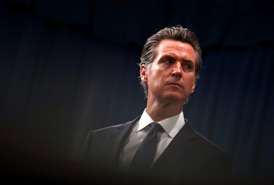 California Gov. Gavin Newsom looks on during a news conference with California attorney General Xavier Becerra at the California State Capitol on August 16, 2019 in Sacramento, California. (Credit: Justin Sullivan/Getty Images)