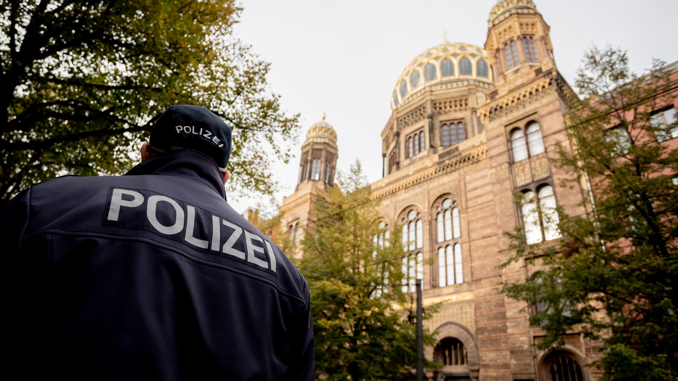 A policeman stands guard in front of the Neue Synagoge (New Synagogue) in Berlin, Germany, as increased security measures are taken following a shooting in Dresden, eastern Germany, on October 9, 2019. (Credit: CHRISTOPH SOEDER/dpa/AFP via Getty Images)