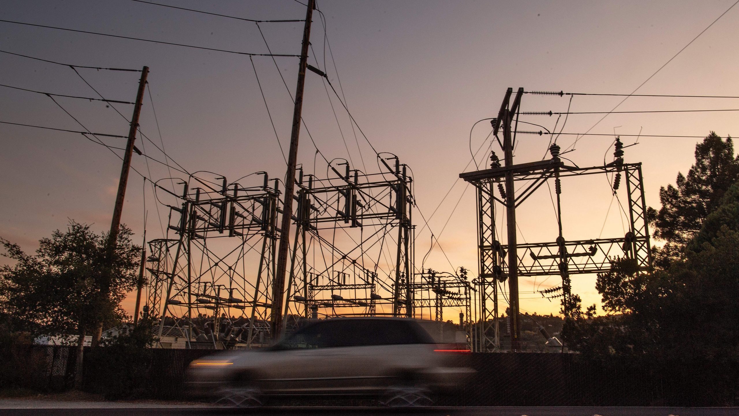 A motorist drives pass a power station in Mill Valley during a Pacific Gas & Electric blackout on Oct. 10, 2019. (Josh Edelson / AFP / Getty Images)