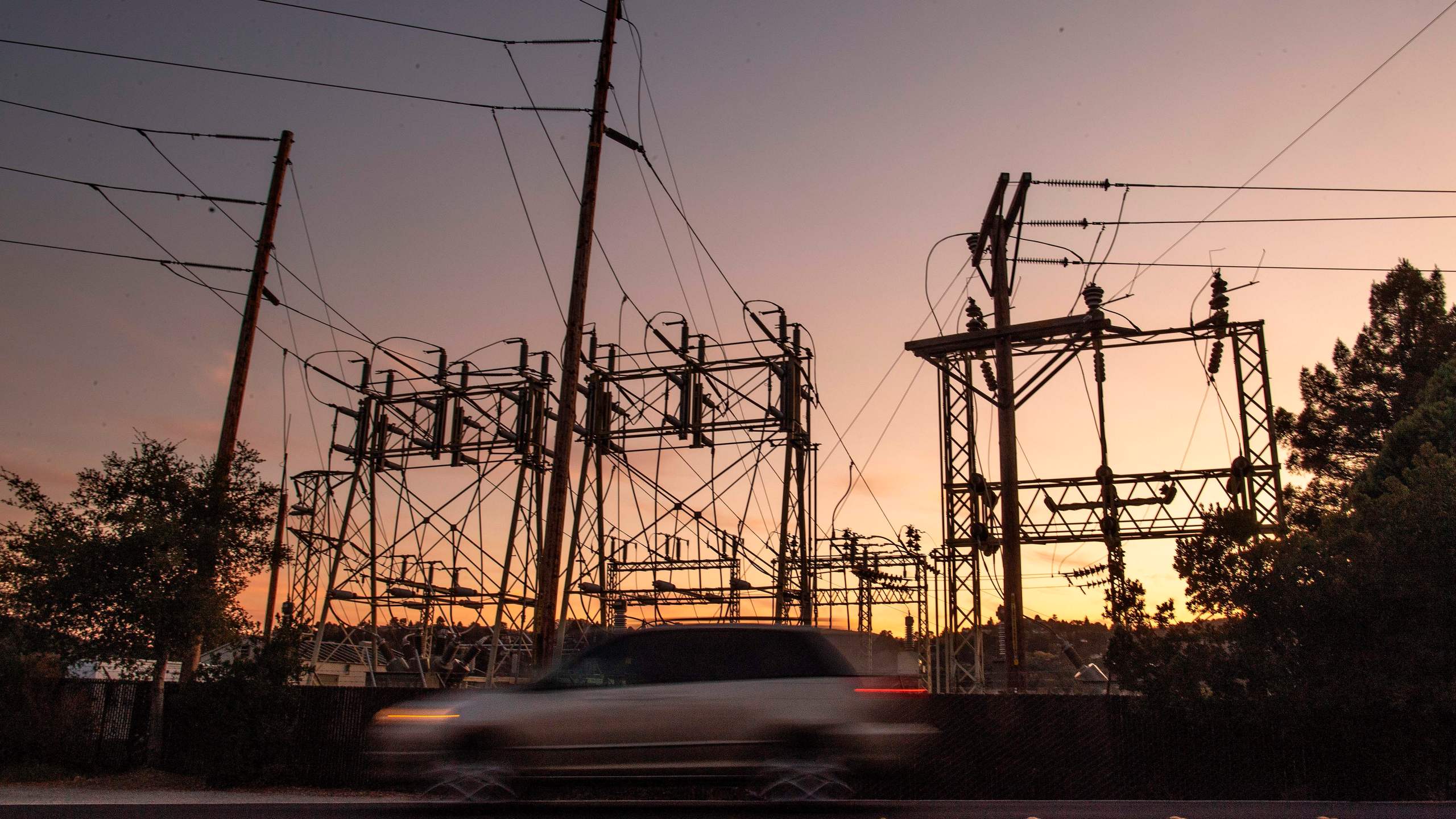 A car drives passed a power station in Mill Valley, Calif., as a blackout continues on Oct., 10, 2019. More than a million Californians were without electricity due to pre-emptive blackouts to prevent wildfires. (JOSH EDELSON/AFP via Getty Images)