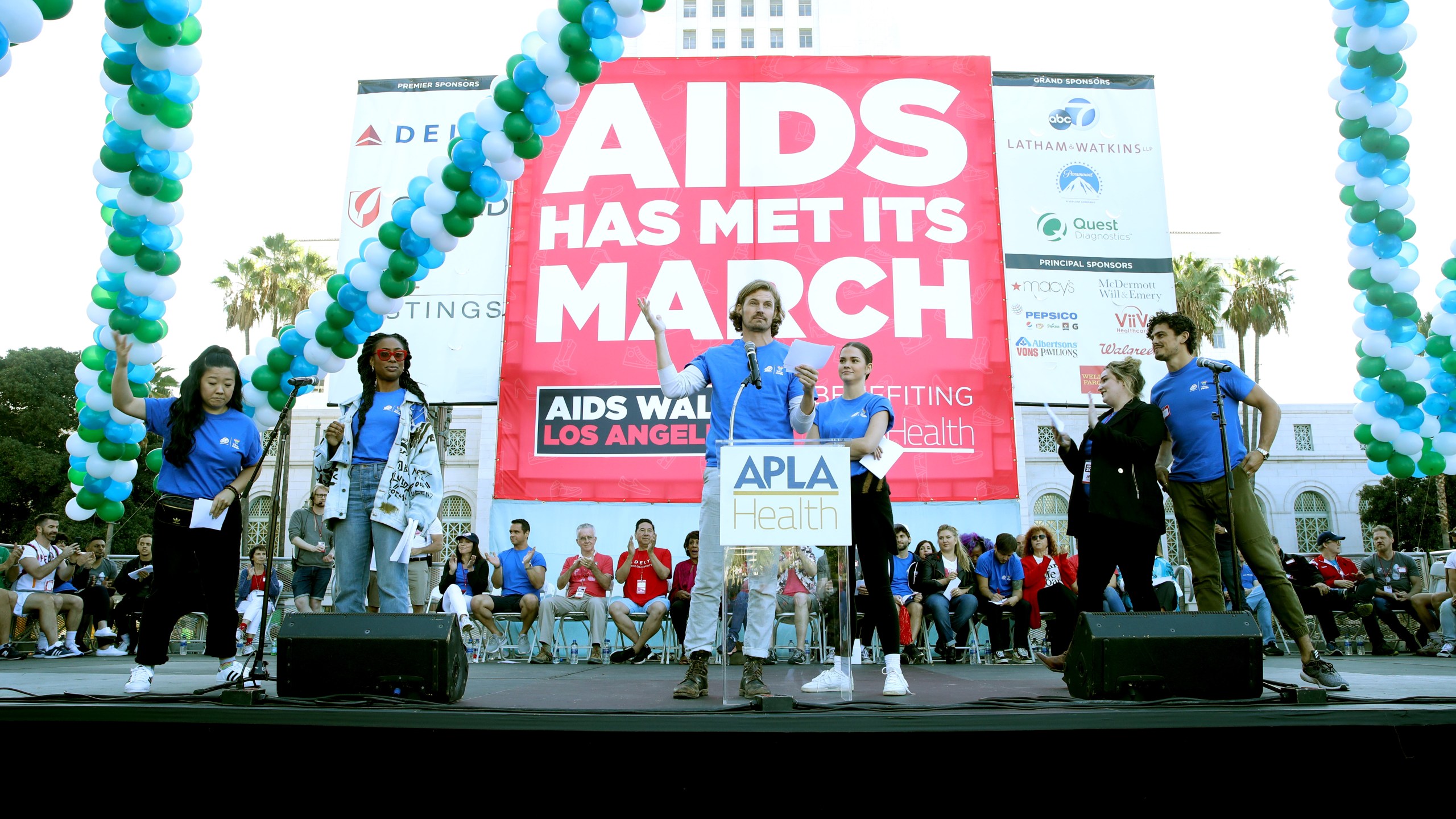 Sherry Cola, Zuri Adele, Josh Pence, Maia Mitchell, Emma Hunton and Tommy Martinez speak on stage during AIDS Walk Los Angeles on Oct. 20, 2019. (Credit: Randy Shropshire/Getty Images for AIDS Walk Los Angeles)