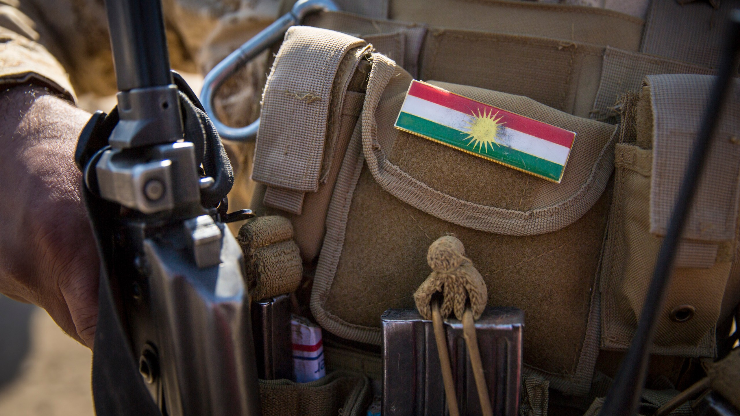 National flag of Kurdistan on a uniform of a Kurdish soldier on April 20, 2017, in Bashiqa, Iraq. (Credit: Florian Gaertner/Photothek via Getty Images)