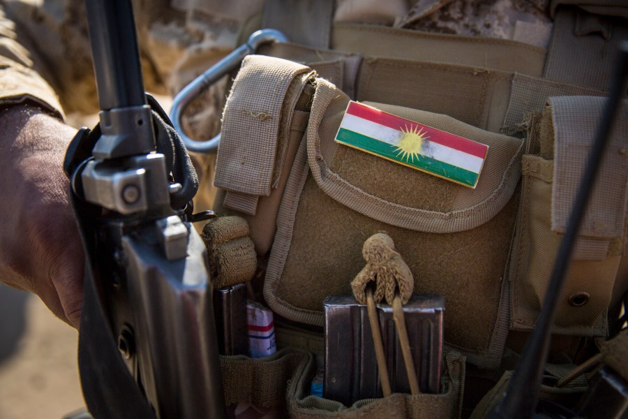 National flag of Kurdistan on a uniform of a Kurdish soldier on April 20, 2017, in Bashiqa, Iraq. (Credit: Florian Gaertner/Photothek via Getty Images)