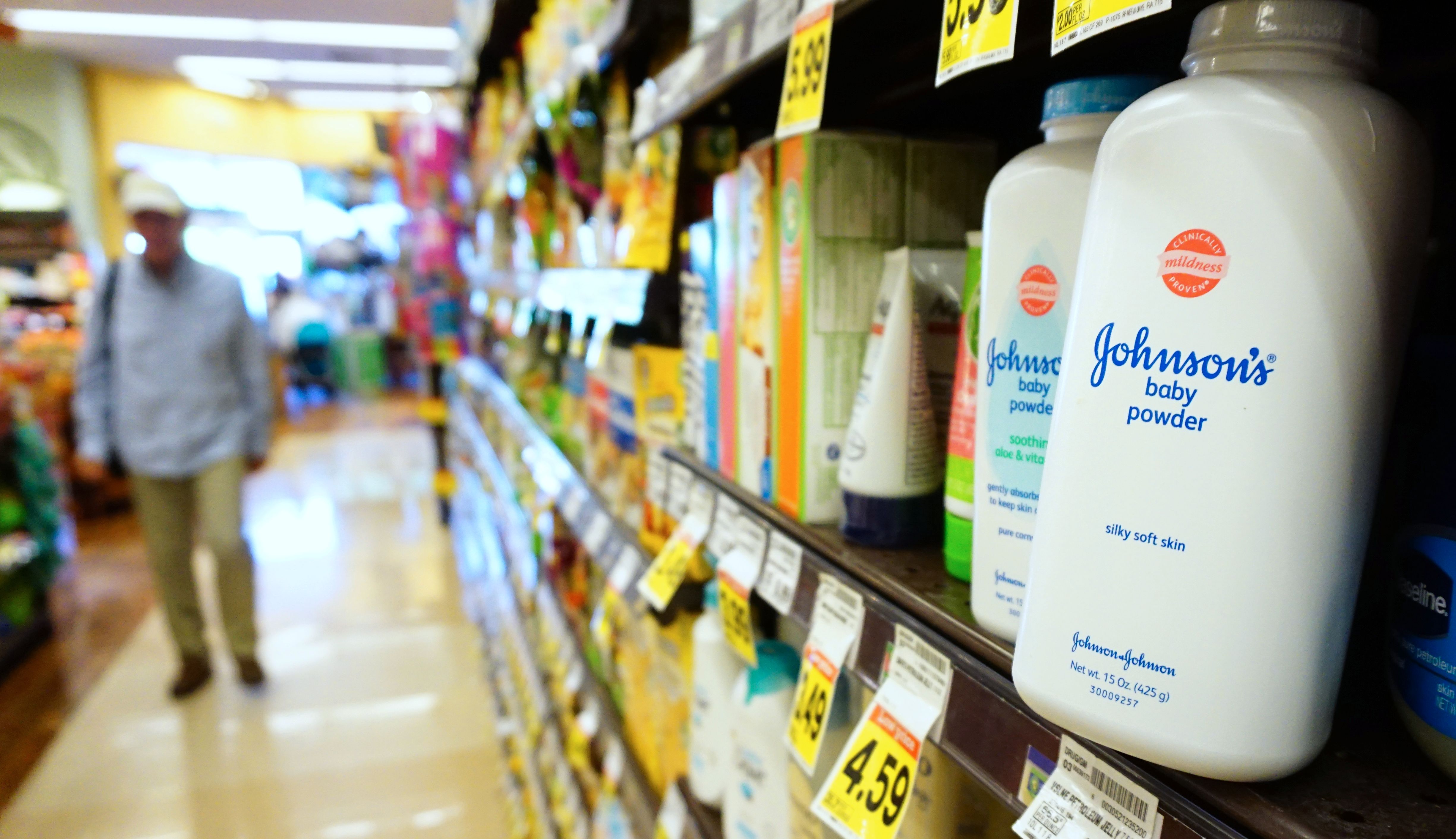 Containers of Johnson's baby powder made by Johnson & Johnson are displayed on a shelf in San Francisco on July 13, 2018. (Justin Sullivan / Getty Images)