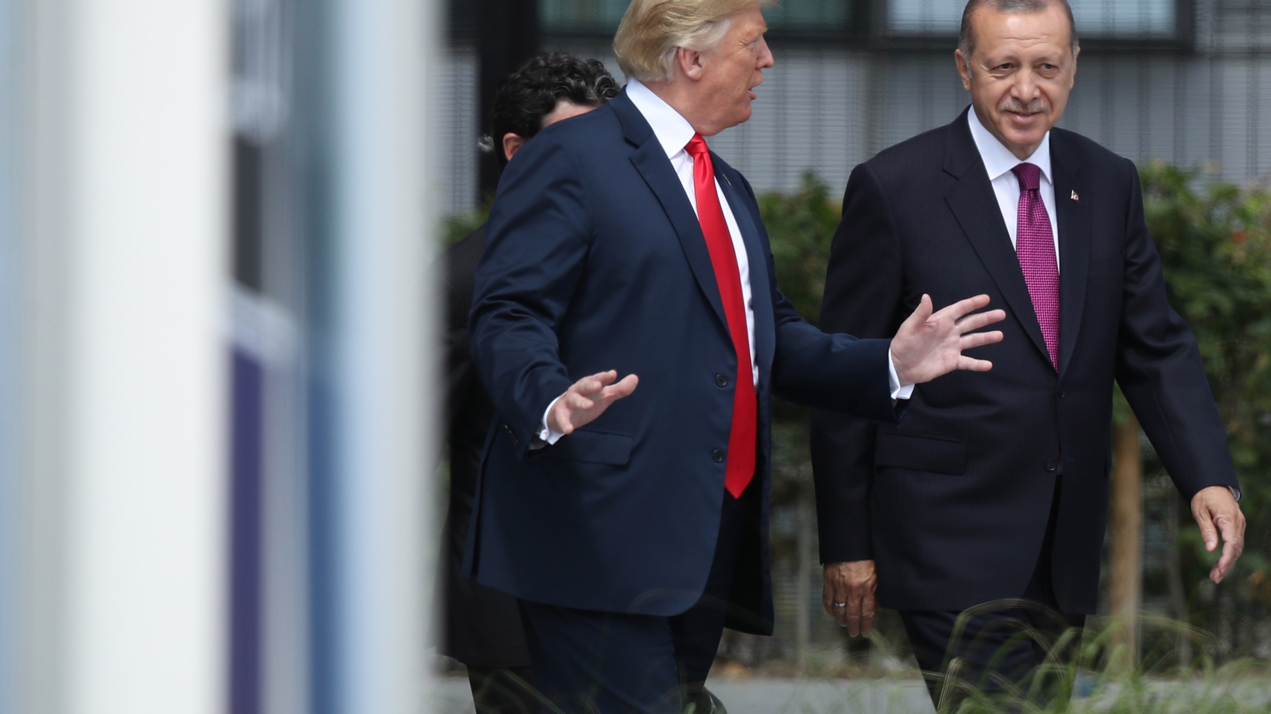 U.S. President Donald Trump, left, and Turkish President Recep Tayyip Erdogan attend the opening ceremony at the 2018 NATO Summit in Brussels, Belgium, on July 11, 2018. (Credit: Sean Gallup / Getty Images)