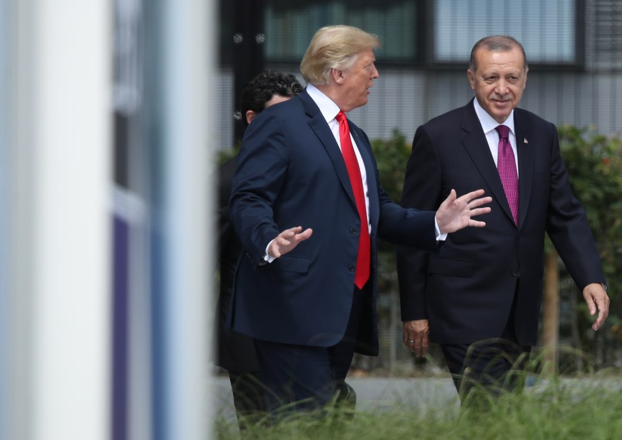 U.S. President Donald Trump, left, and Turkish President Recep Tayyip Erdogan attend the opening ceremony at the 2018 NATO Summit in Brussels, Belgium, on July 11, 2018. (Credit: Sean Gallup / Getty Images)