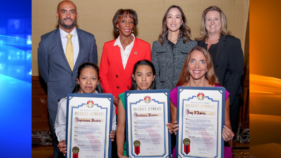 (Left to right, bottom row:) Esperanza Mendez of Los Angeles, Virdiana Mendez of Los Angeles, Amy D'Ambra of Rolling Hills and Joel Ortuno Jr. of Anaheim (not pictured) were honored by Los Angeles County District Attorney Jackie Lacey for acts of courage on Oct. 4, 2019. (Credit: Los Angeles County District Attorney's Office)