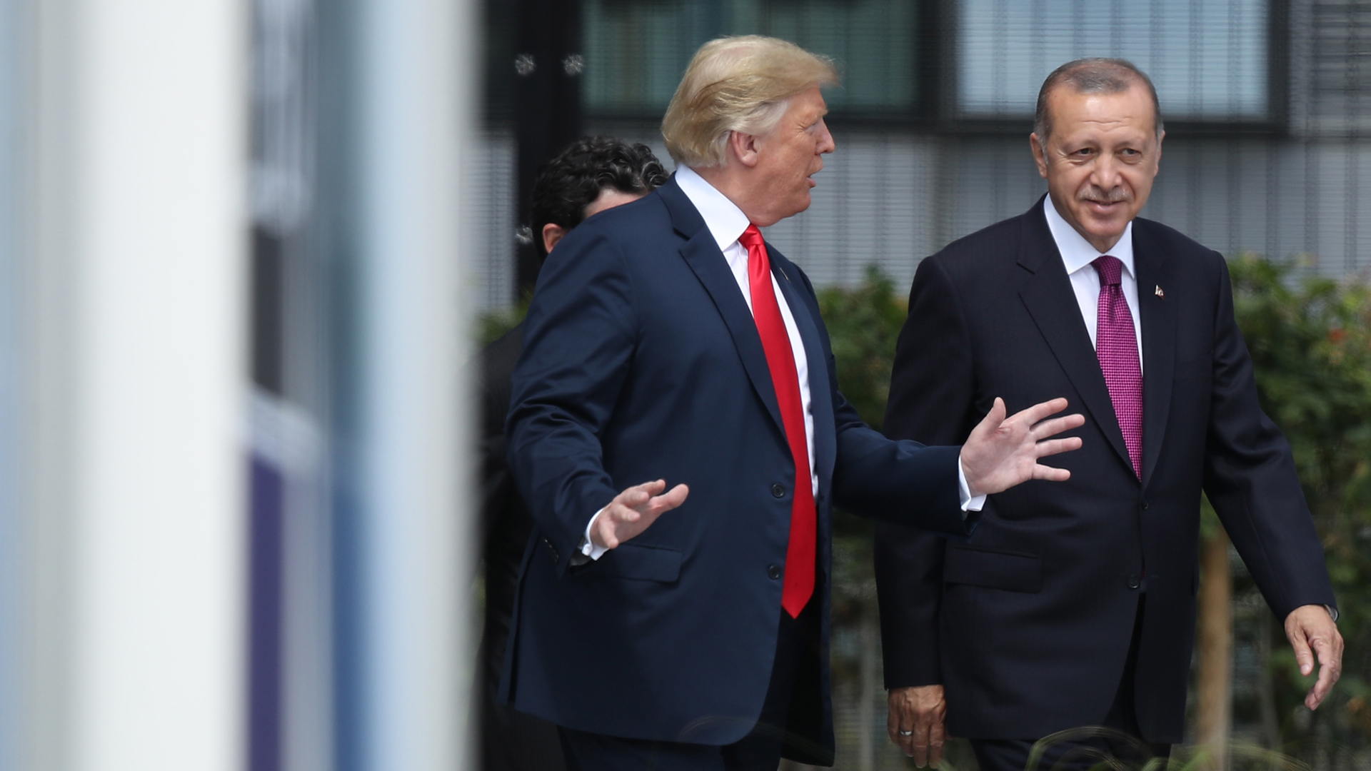 U.S. President Donald Trump, left, and Turkish President Recep Tayyip Erdogan attend the opening ceremony at the 2018 NATO Summit in Brussels, Belgium, on July 11, 2018. (Credit: Sean Gallup / Getty Images)